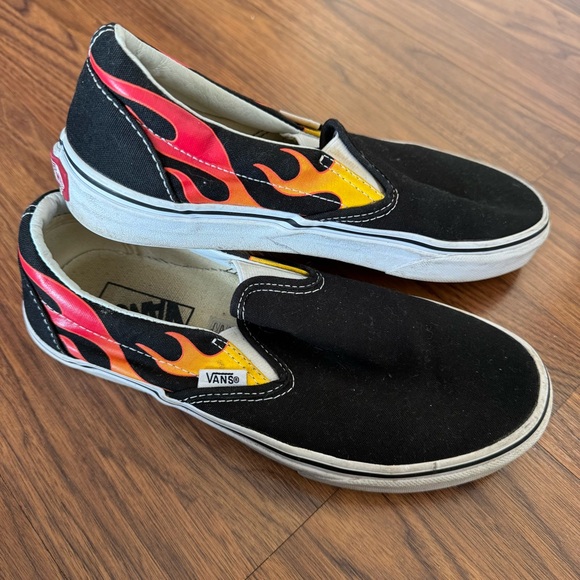 Vans Shoes - Vans Black Slip-Ons with Red and Yellow Flame Pattern